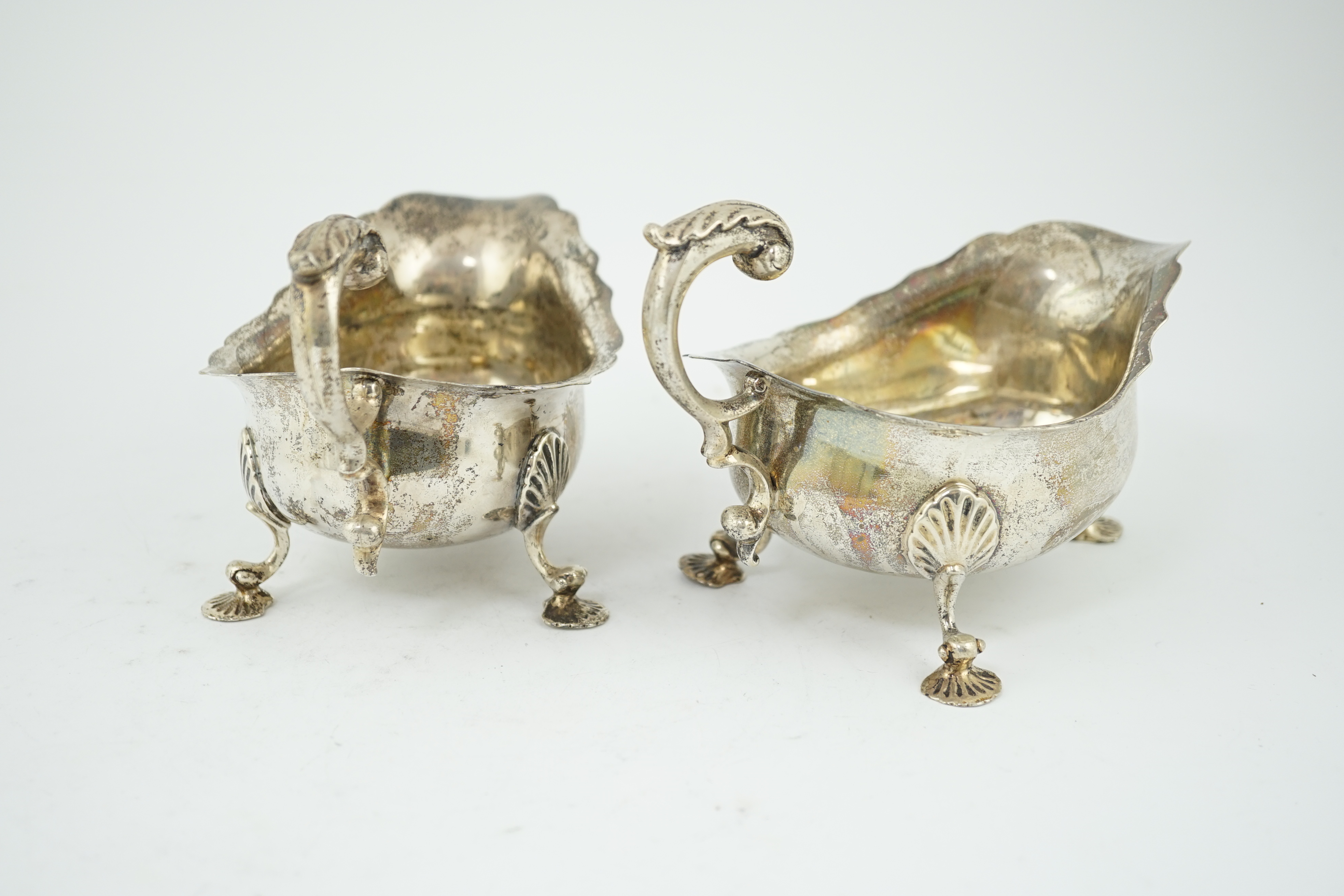 A pair of George V silver sauceboats, by Harrod's Ltd